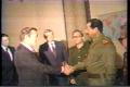 Iraqi President Saddam Hussein greets Donald Rumsfeld, special envoy of Reagan