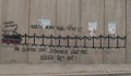 Graffiti op de muur bij Ramallah