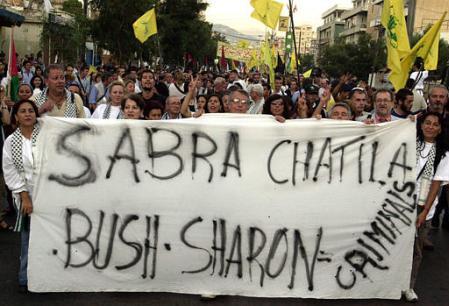 Demonstrators, carrying flags of the Lebanon's militant Hezbollah group.