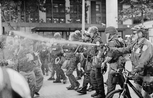 Seattle police riot on June 2, 2003, on peaceful LEIU protesters