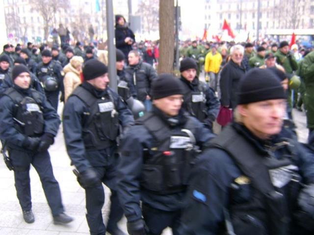 riot cops in black and green