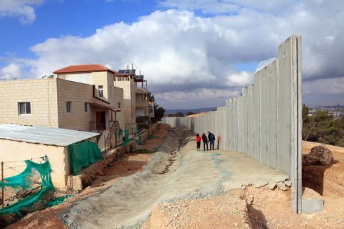 Israel's wall being built in al-Walaja village, December 2010. Anne Paq