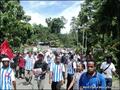 Pro-independence Papuans march in t-shirts bearing the 'Morning Star' flag. © We